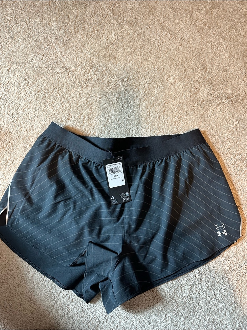 NWT Under Armour running shorts women’s medium